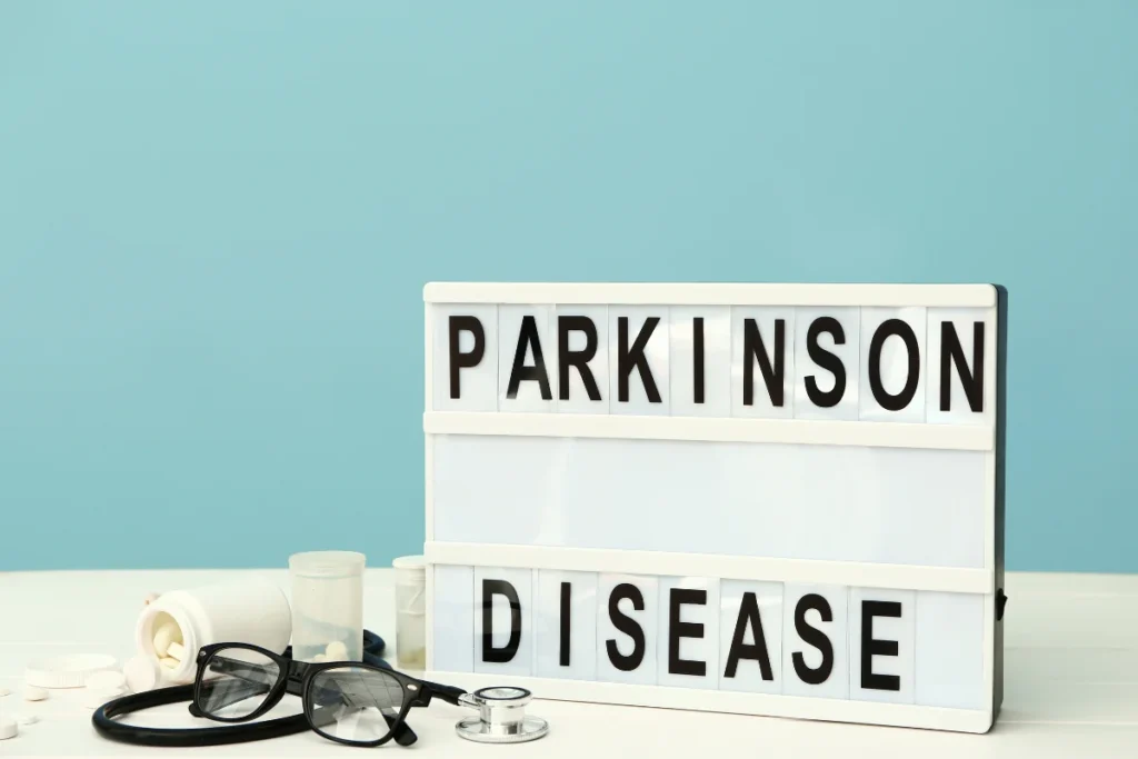 Quadro escrito Doença de Parkinson.
